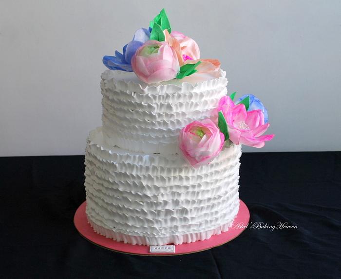 Floral cake with waper paper flower arrangement