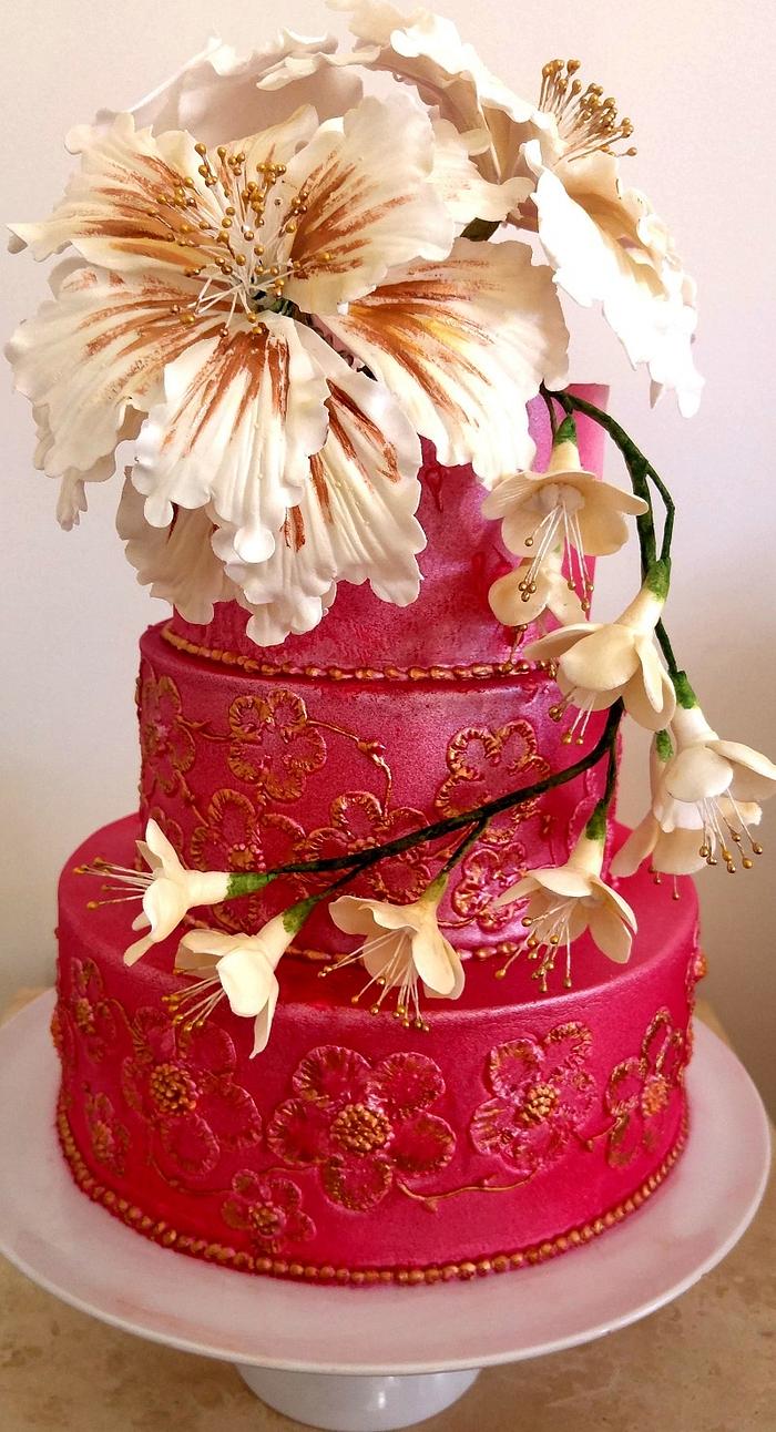 Gold and red brush embroidery cake