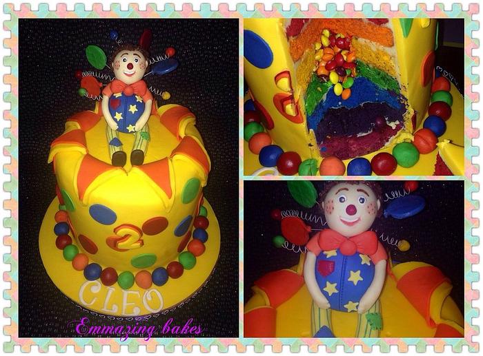 Mr tumble-hidden explosion rainbow cake