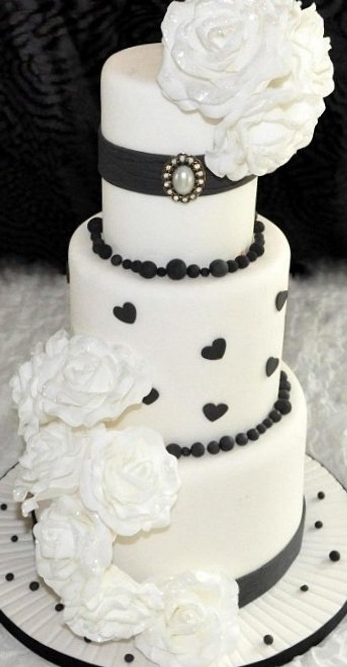 Black and White cake with white roses