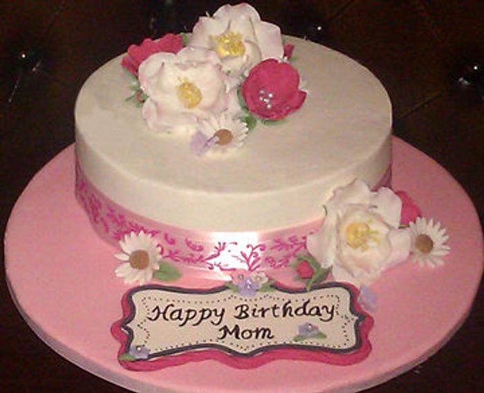 Simple butter cream cake with fondant flowers