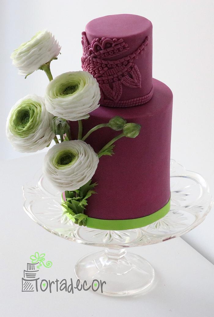 White Ranunculus flower wedding cake