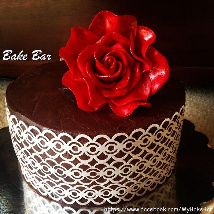 Red rose and filigree cake