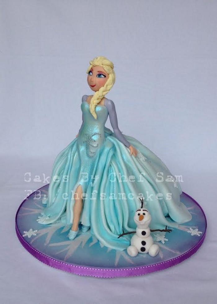 Elsa doll cake and Olaf cupcakes