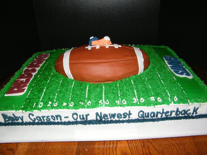 Football themed baby shower cake