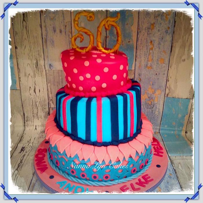 Topsy turvey 50th joint birthday cake