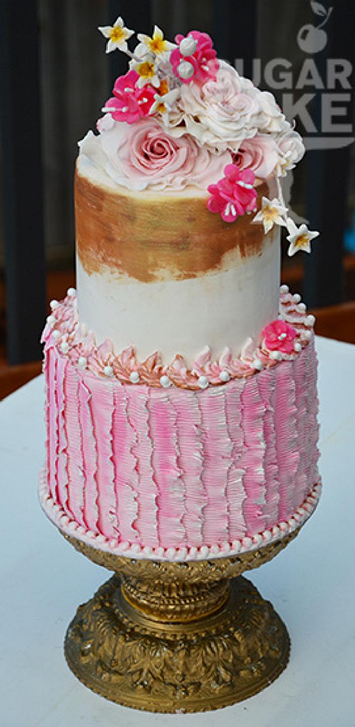Pink ruffle cake with flowers