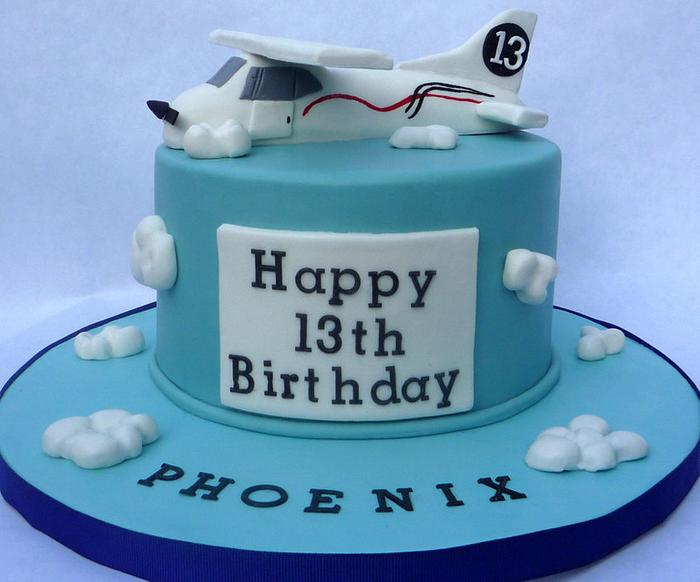 Airplane themed cake: Cessna edible airplane topper