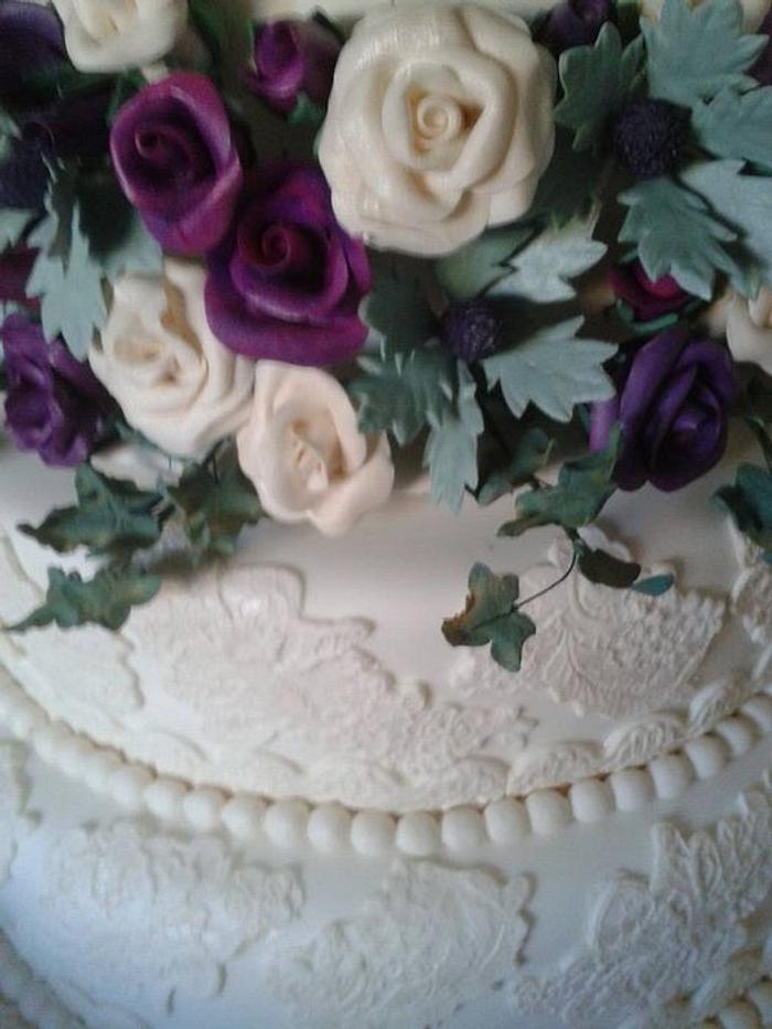 Roses, Sea Holly and lace wedding cake