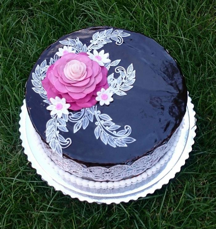 Chocolate birthday cake with flowers