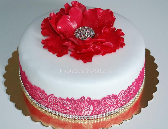 Cake with brooch