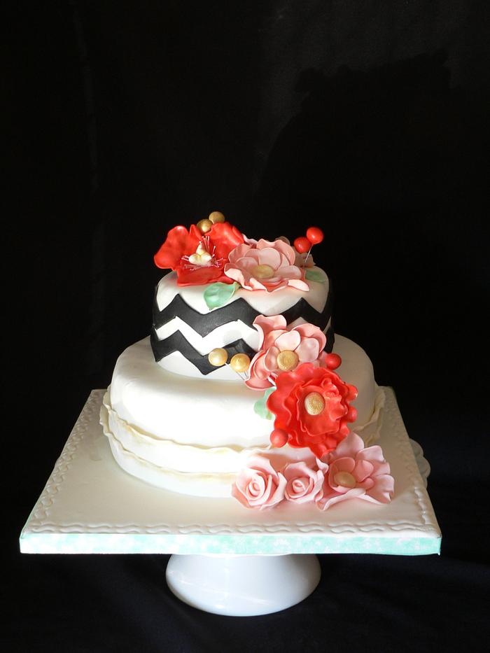 Coral and gold flowers cake