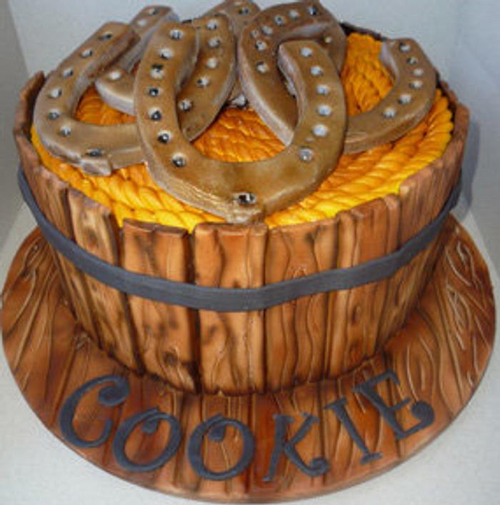 Horseshoes/rope in wooden bucket cake