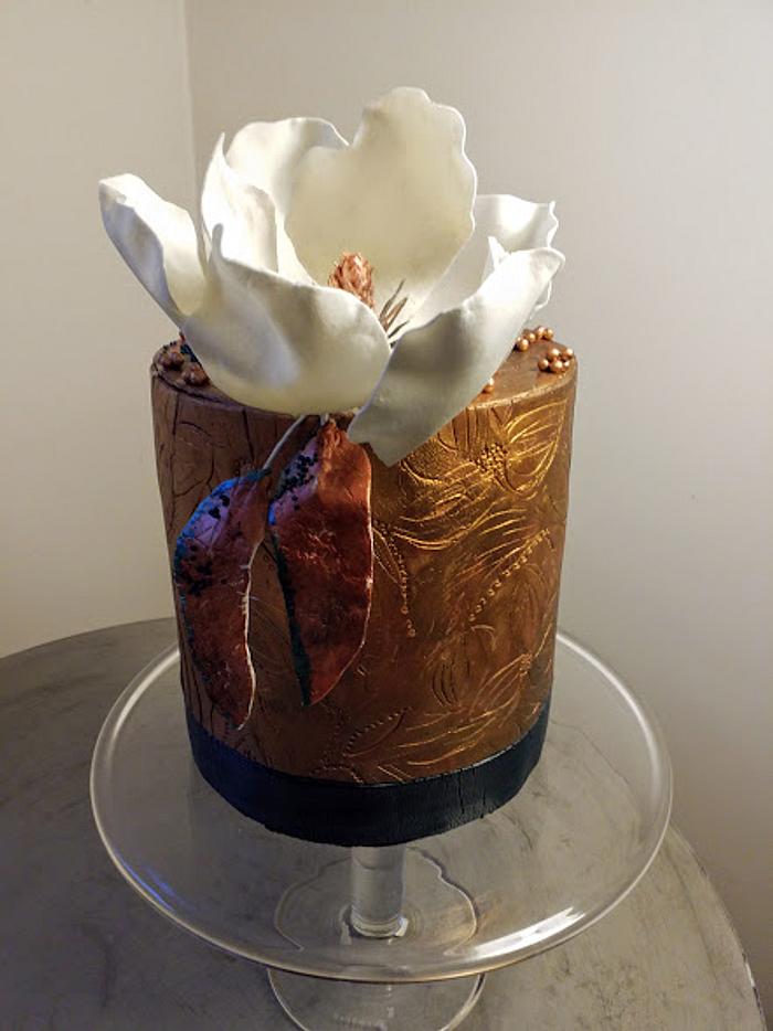 Birthday cake with magnolia flower