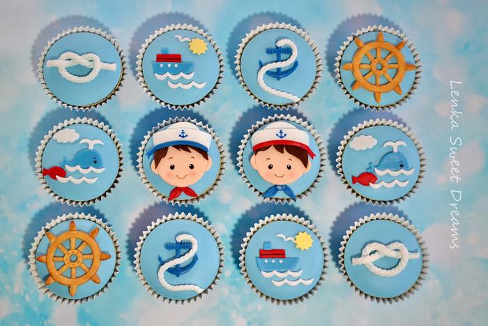 Nautical cupcakes for two little twins .