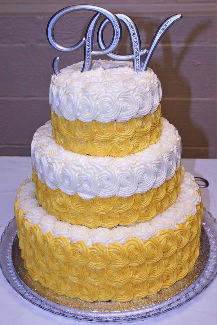 Yellow & white rosette wedding cake & sheet cake