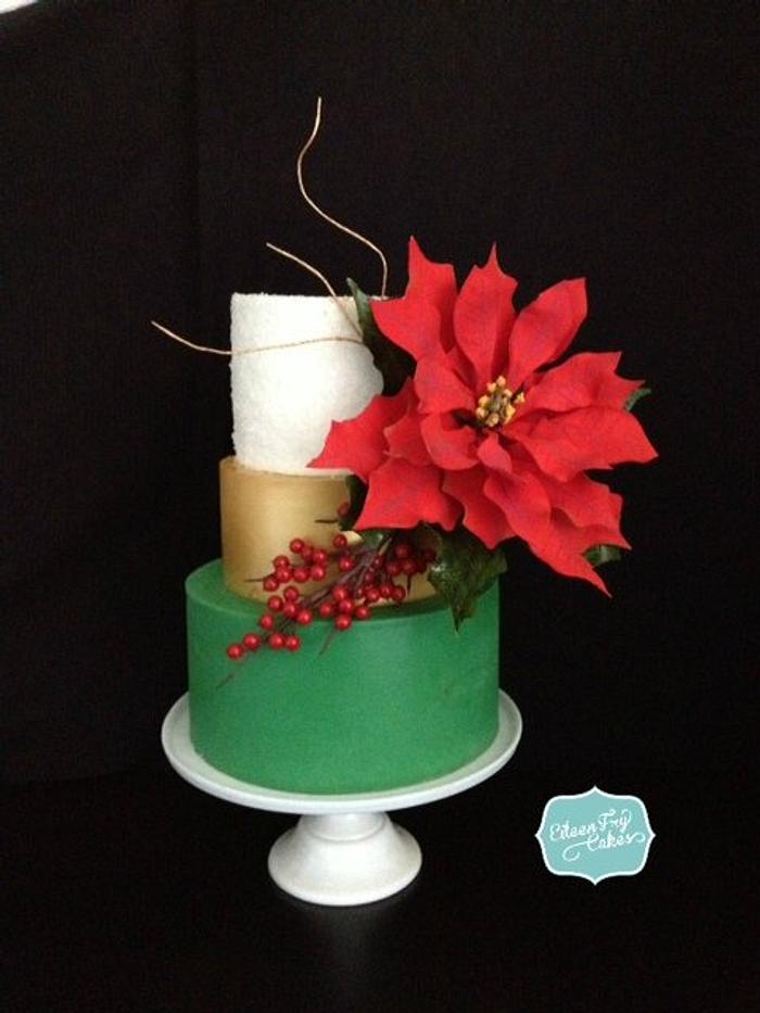 Christmas cake with a sugar poinsettia