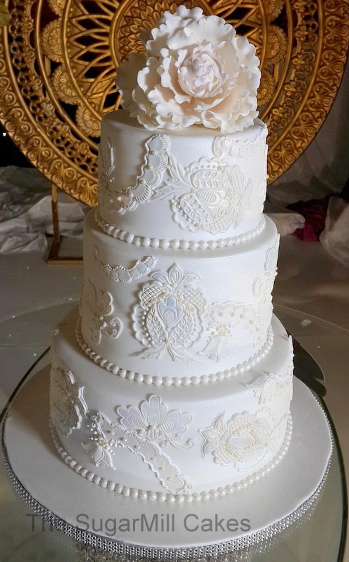 a white on white wedding cake