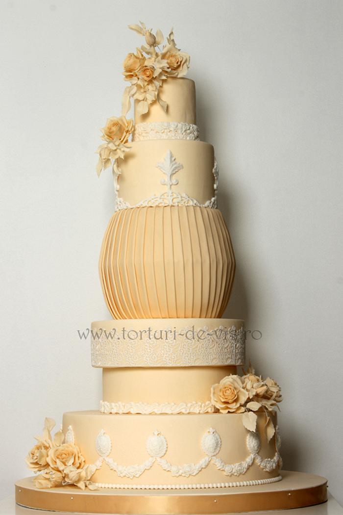 Ivory wedding cake with roses