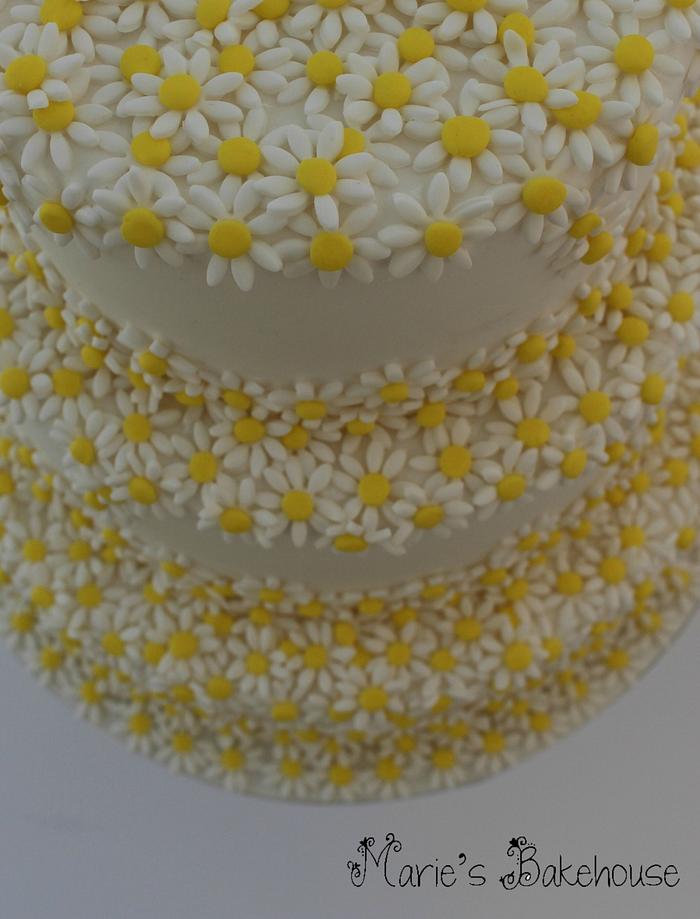Cascading daisy wedding cake