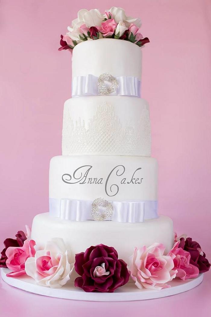 Wedding cake with pink and white roses