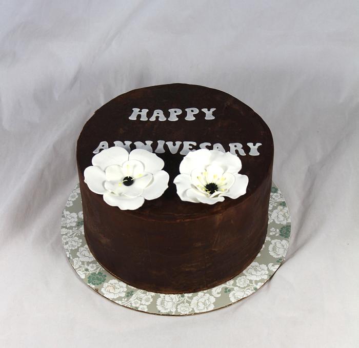 Ganached anniversary cake