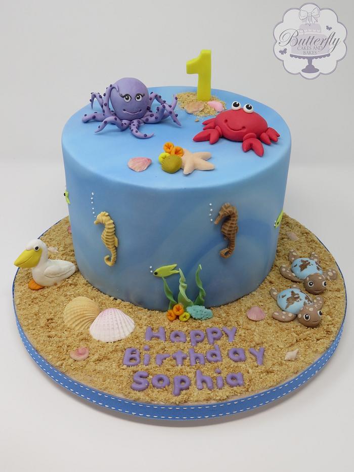 Sea and Travel themed 1st birthday cake