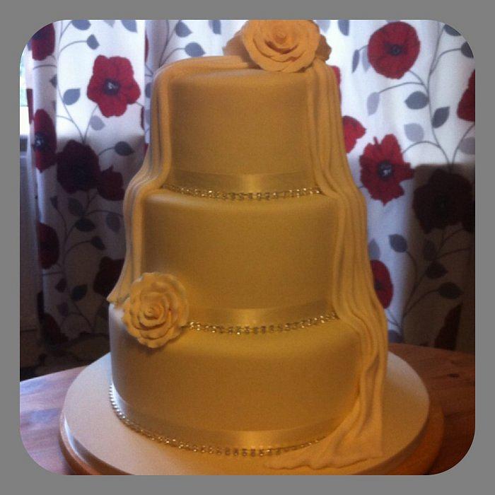 Roses & drapes wedding cake