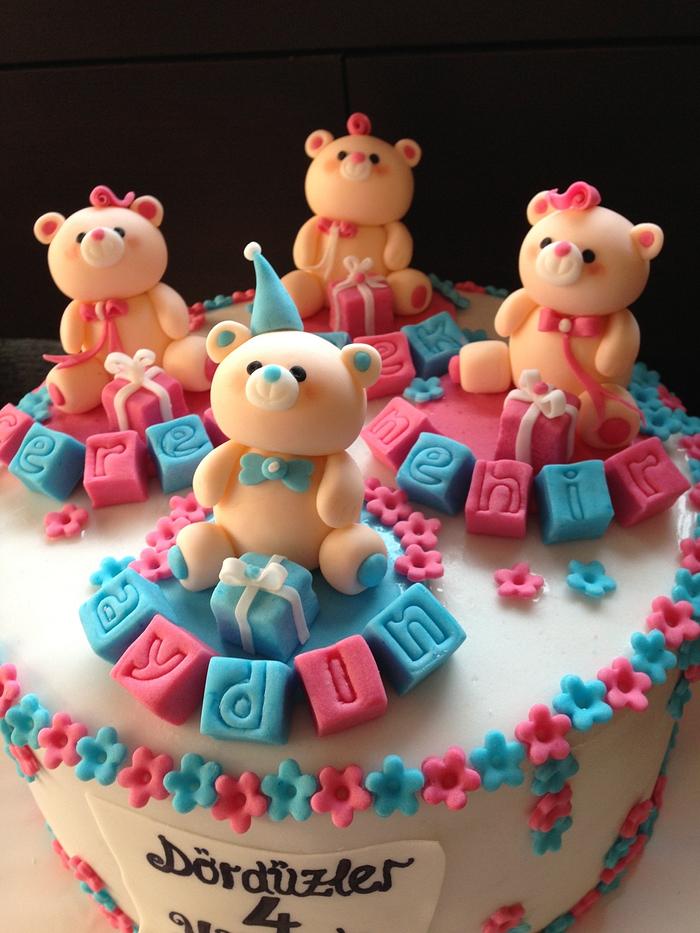 Birthday cake for quadruplets