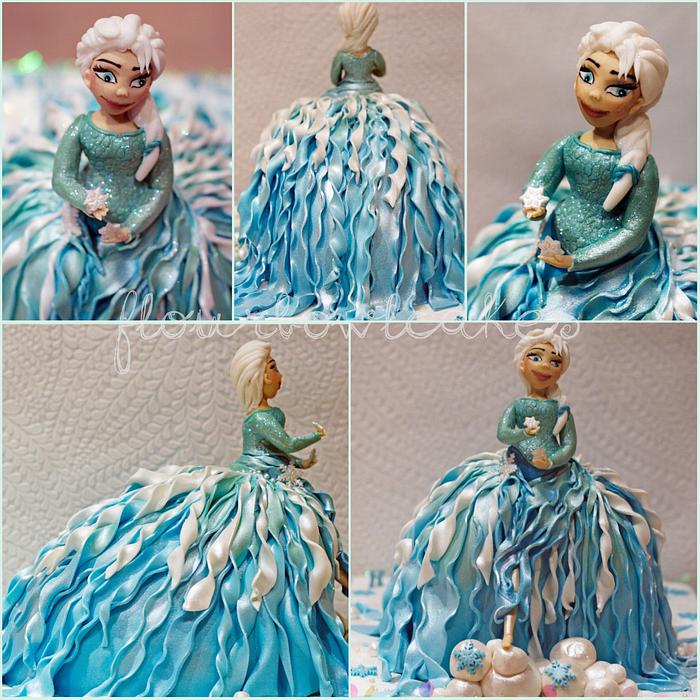 Elsa from the Disney film Frozen.. Walking Doll Cake