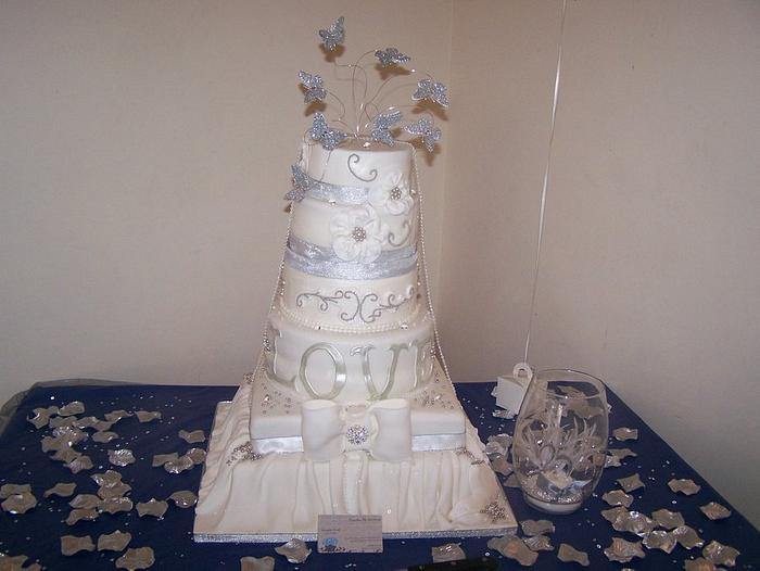 the big silver and white wedding cake