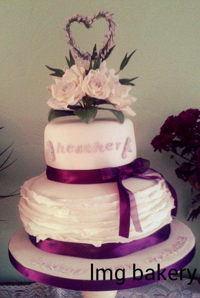 handmade heather 80th birthday cake with frills and roses