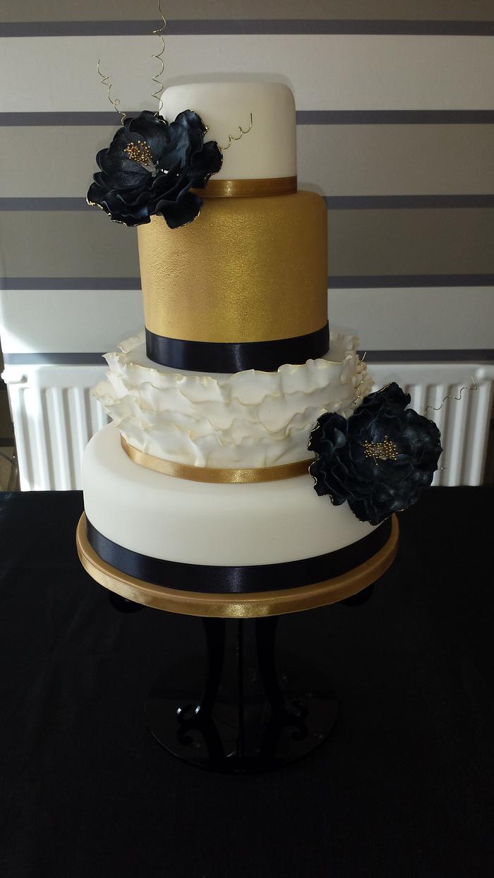 gold & black ruffle cake