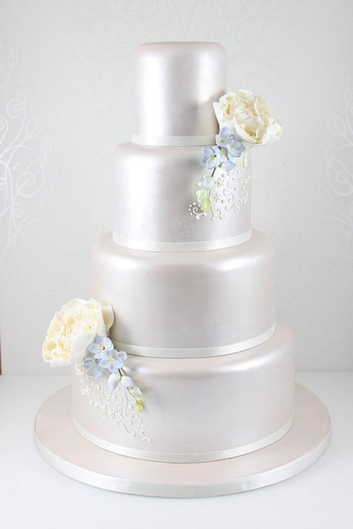 Lustred peony and freesia wedding cake