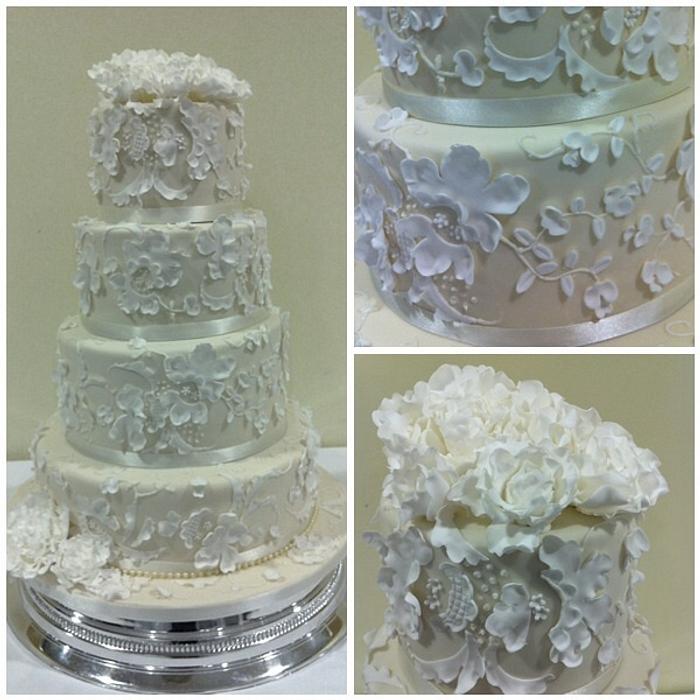 Four tier lace wedding cake
