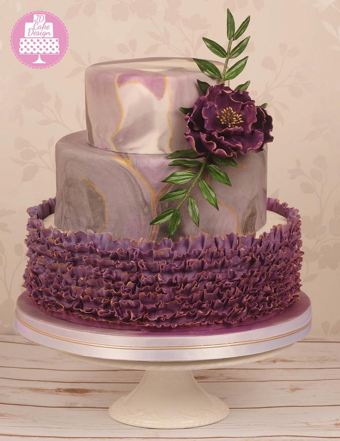 Purple and gold marble effect cake