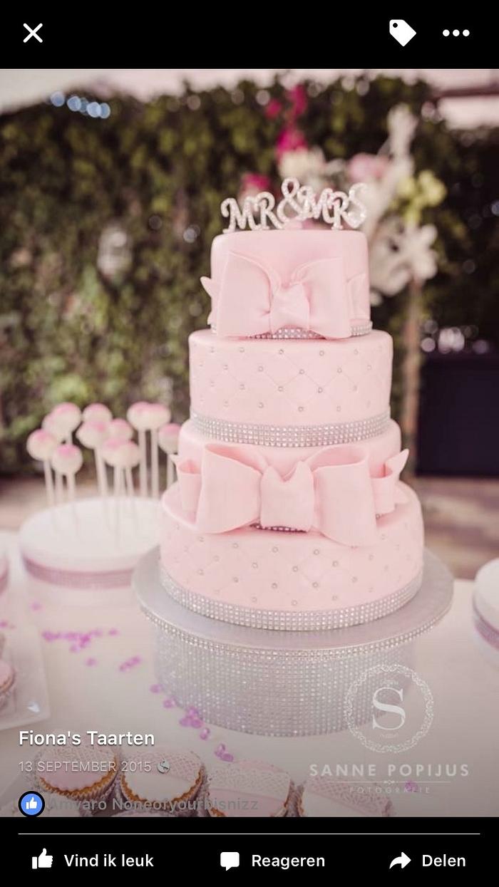 Pink bling wedding cake 