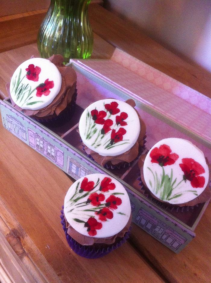 Hand painted poppy cupcakes