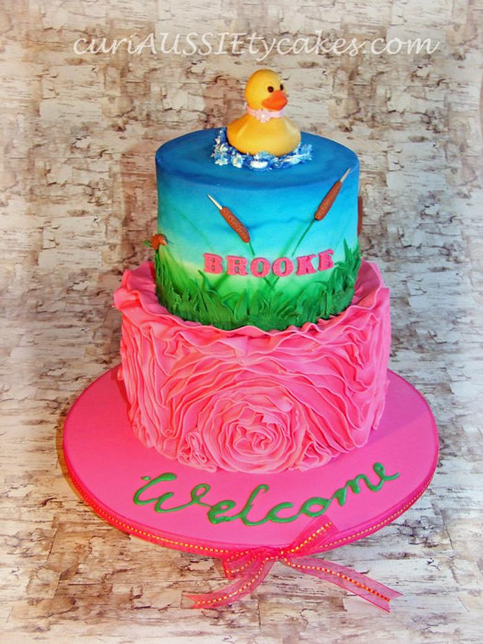 Rubber ducky welcome baby cake
