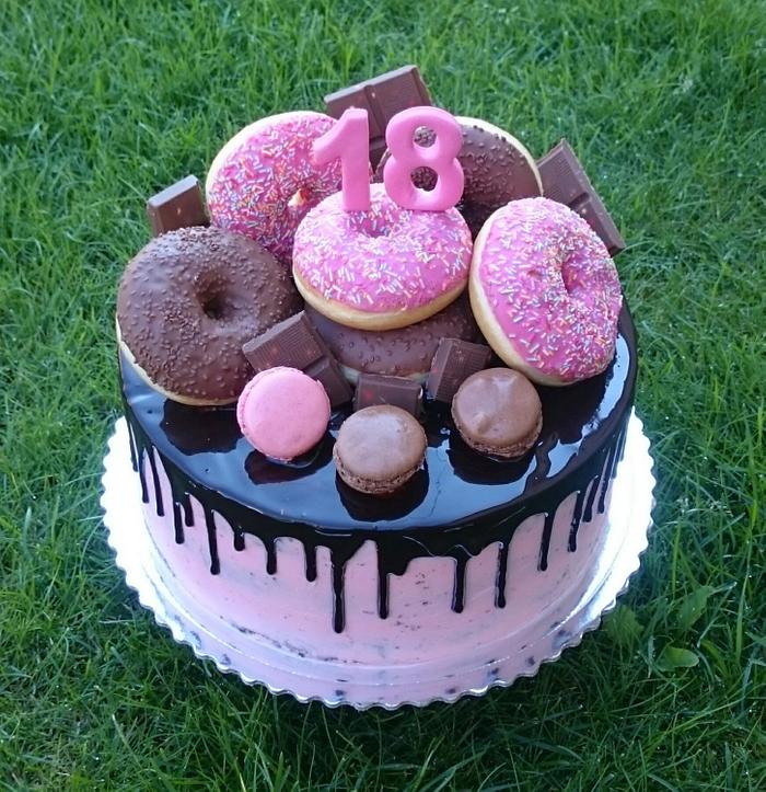 Chocolate cake with donuts