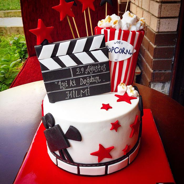 Birthday Cake with popcorn, camera and stars