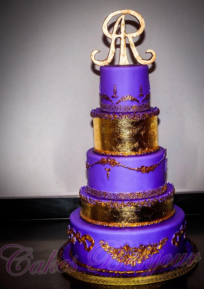 Violet and gold wedding cake.