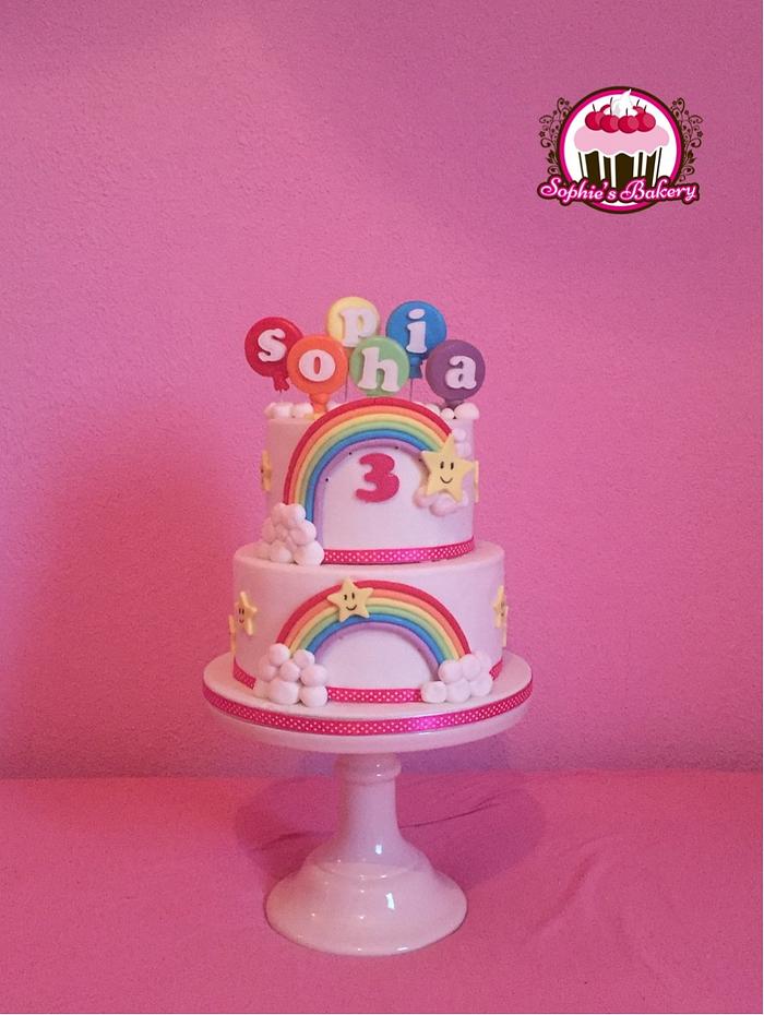 Rainbow stars clouds and balloons cake