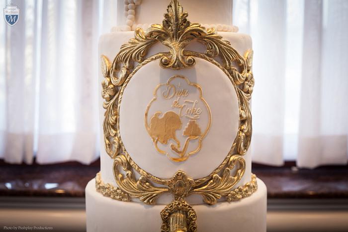 White  & gold wedding cake 