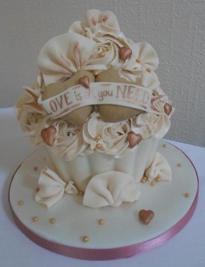 'Love is all you need' Giant cupcake