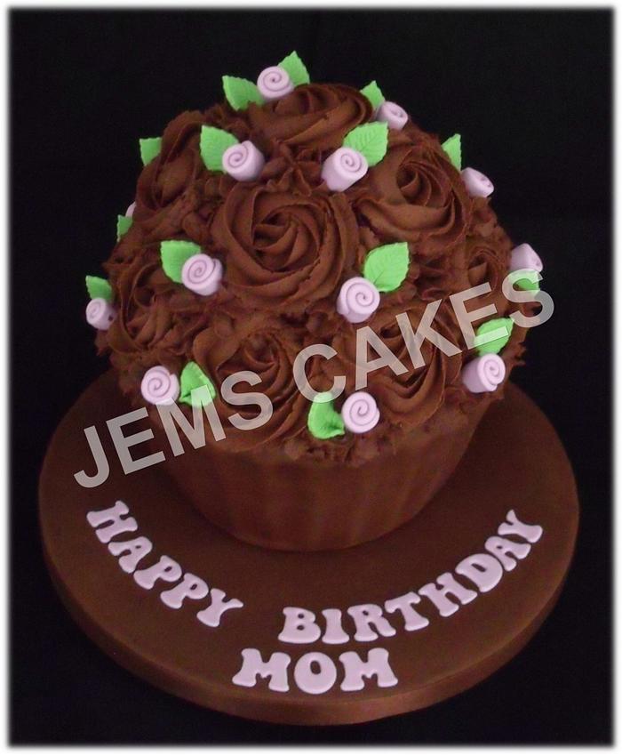 Chocolate giant cupcake with rosebuds