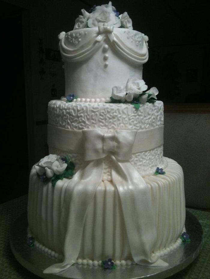 Wedding cake...first tiered fondant cake!