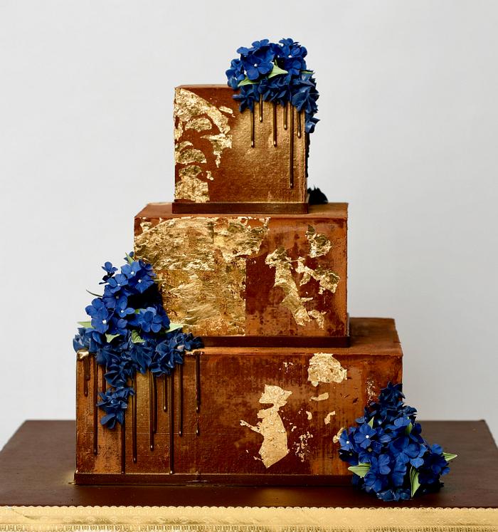 Gold and chocolate birthday cake