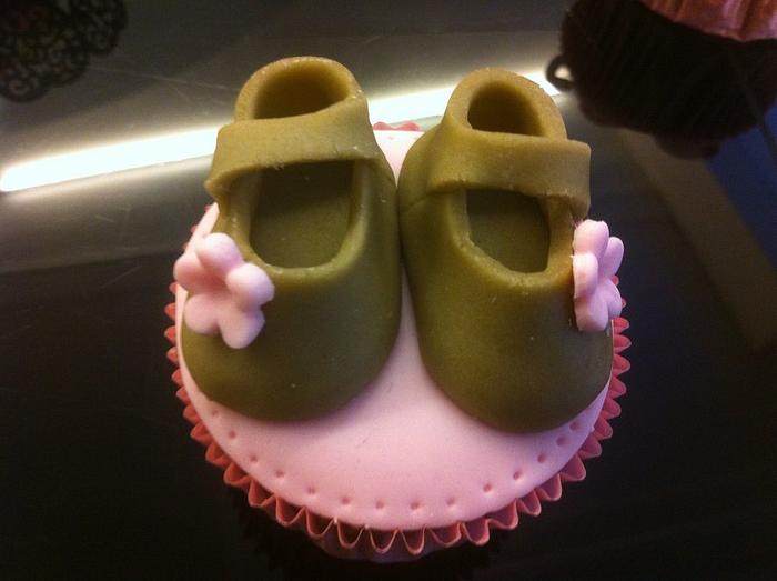 Baby shoes cupcake