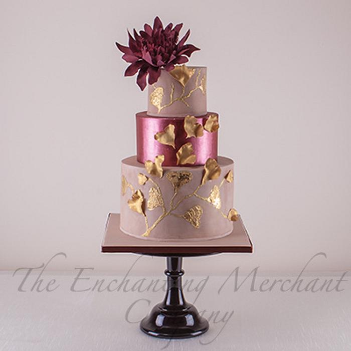 Suede, shimmering marsala and antiqued gold wedding cake